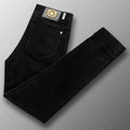 Luxury brand thick men's black jeans, new autumn/winter style, eagle head gold.