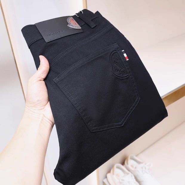 Luxury brand thick men's black jeans, new autumn/winter style, eagle head gold.