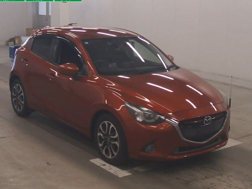 2015  Mazda  Demio 
DJ5FS
XD Touring 
AT
1,500cc 
Diesel
76,202km 
Red
Alloys
Bluetooth
Cruise Control
Push Start button
One Owner 
Smart Key 
Steering  Controls
HD  Nav
