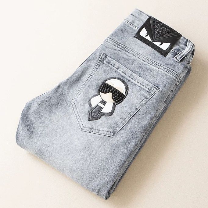 Luxury brand thick men's black jeans, new autumn/winter style, eagle head gold.